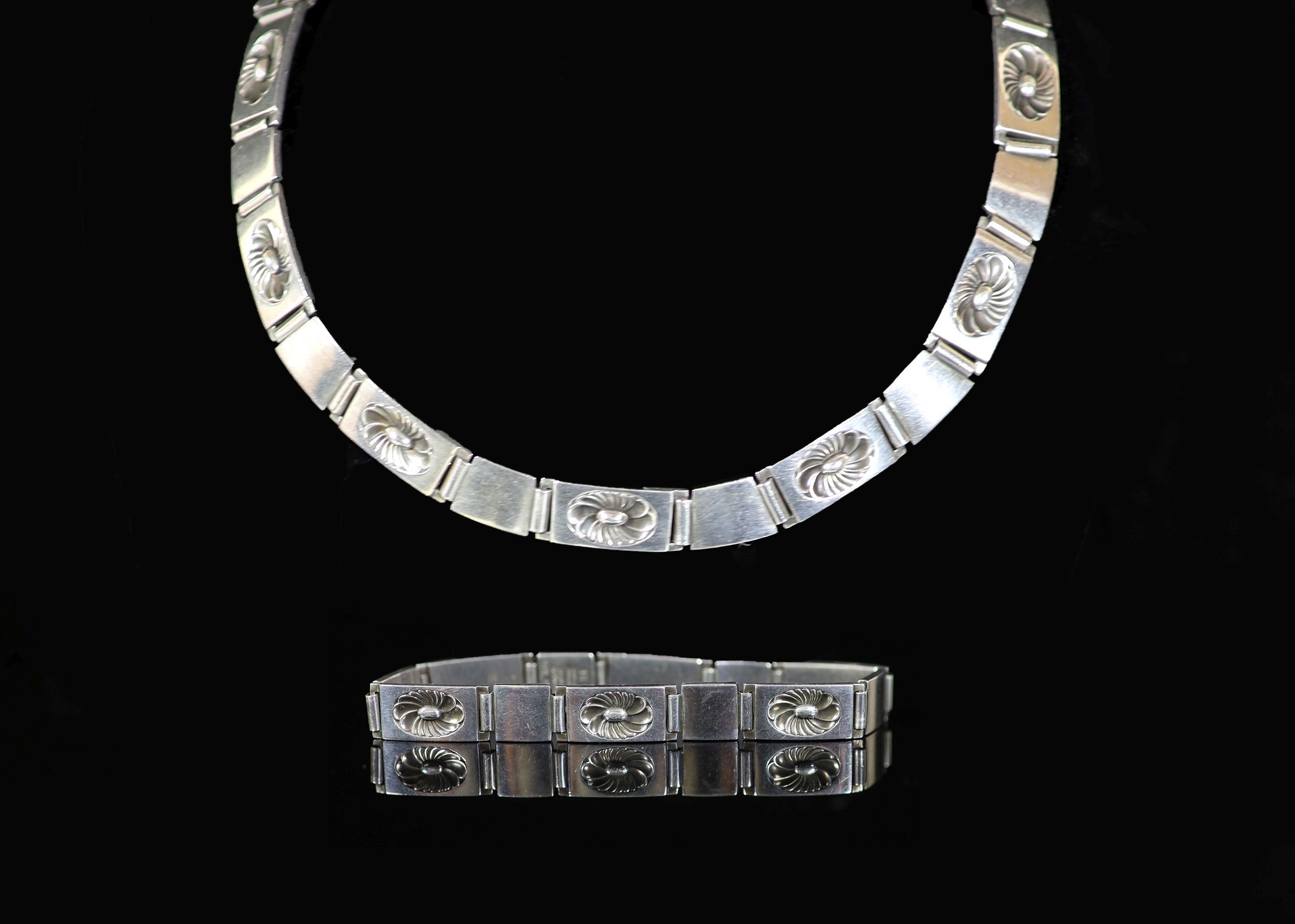A mid 20th century Georg Jensen sterling silver necklace and matching bracelet, design no. 56 B & 60B